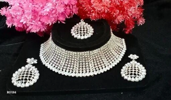 Bridal set*BRIDAL STONE JWELLERY SETName: STONE JWELLERY SETBase Metal: AlloyStone Type: Artificial StonesSizing: AdjustableType: Necklace Earrings Maangtika - Free Size 