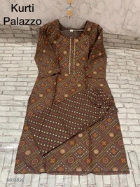 BEAUTIFUL KURTI. AND PANT**New designs of Kurti Pant and plazo sets* Fabric - *Rayon*  - XL 