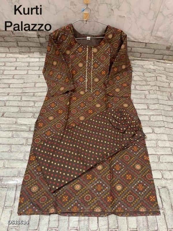 BEAUTIFUL KURTI. AND PANT**New designs of Kurti Pant and plazo sets* Fabric - *Rayon*  - XL 