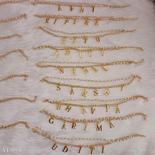 Gold  Catalog Name: *Personalized Whitemoti Bracelet**Rakshabandhan Offer*‼️ *white Moti bracelet for her*‼️👉Can be used as lumba and bracelet👉Price inclusive of 5 letters👉 Extra 50Rs. for each extra letter😊😄 - Golden Fizz, FREE