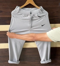 Name : NIKE FASHION LYCRA PANT   Product Details :🔥NIKE HIGH FASHION LYCRA  PANTS FOR MEN👖🔥Black🔥light grey🔥oliveFull stretchable Lycra trouser 😎Quality guarantee ✅Ankle length ✅Size *M28- 30* *L-32* *Xl-34* *xxl-36