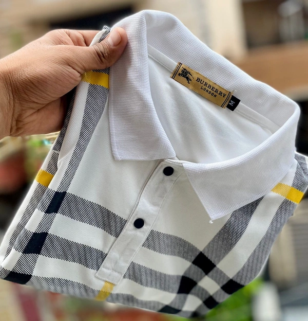 *BRAND - BURBERRY**COLLAR T-SHIRTS ULTIMATE ARTICLE*Designer article  *BEST QUALITY* IMPORTED SAP MATTY stuffFront printing design *7aQuality ✅ Store Articles✅**CUSTOMER FULLY SATISFACTION😍👌**SIZE-  M(38) L(40) XL(42) freeship**Quality Fully Guaranteed* Sap matty stuff very smooth and soft*BEST FOR PERSONAL USE*