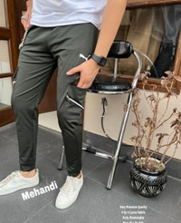 *Very Very Premium PUMA New Track-pants store article*Brand- *PUMA*  showroom ARTICLE 🔥🔥🔥🔥*lycra 4 By 4 Fabric Comfortable 👌🏻* *10A quality**check Size-M28-30,L32,XL34,XXL36*Colours 4- *Black,NAVY, Grey, Mehandi* Free Ship**1001% Quality Guaranteed* full stock available take open Orders Avl 🔥**365 Days open orders*No Cancellation
