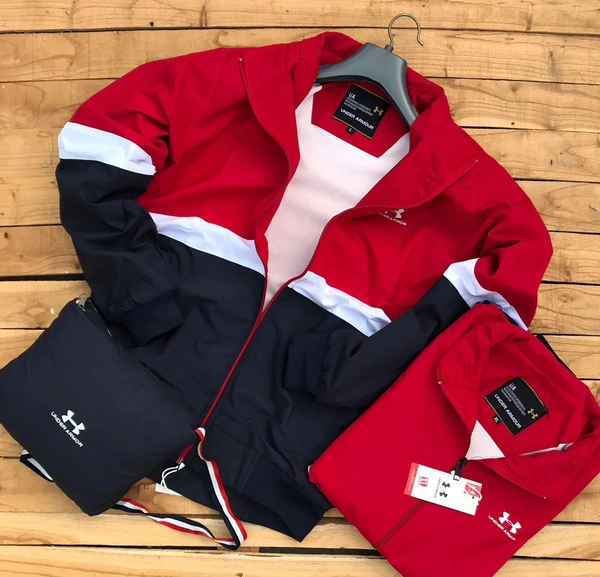*Very Premium Quality UNDER ARMOUR WINDCHEATER*😍🎉*New New New feature*🎉 👉*Top quality light weight Windcheater with *inbuilt water resistant carry bag**Brand - UNDER ARMOUR**WIND BREAKER &  FULLY WATERPROOF FABRIC*👉IMPORTED TPU FABRIC👉INSIDE NET*PREMIUM QUALITY**SIZES M38, L40, XL42, XXL44**LATEST SHOWROOM ARTICLE** FS**Note: pls don’t compare with cheap quality market prod