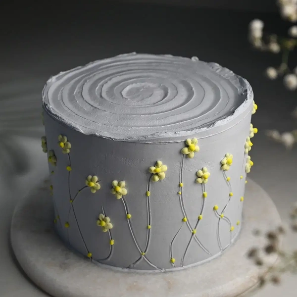 Delicate Flower Adorned Cake - 1 Kg