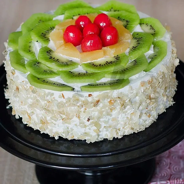 Fresh Fruits Topped Almonds Cake - 500 Gm