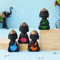 Black & Golden Polyresin Handcrafted Meditating Buddha Statue