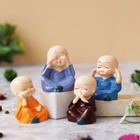 Set Of 4 Cute Little Monk Buddha Statues