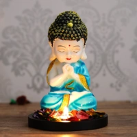 Polyresin Blue And White Praying Monk Buddha Statue