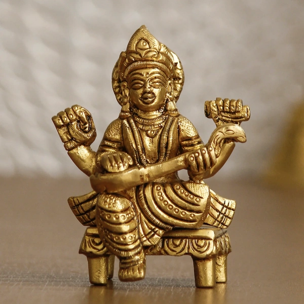 Golden Handcrafted Brass Goddess Saraswati Idol On Chowki
