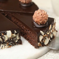 Ferrero Infused Celebration Cake - 500 Gm