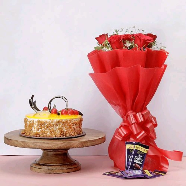 8 Red Roses With Butterscotch Cake & Chocolates