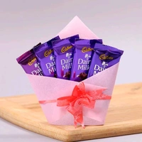 8 Red Roses With Butterscotch Cake & Chocolates
