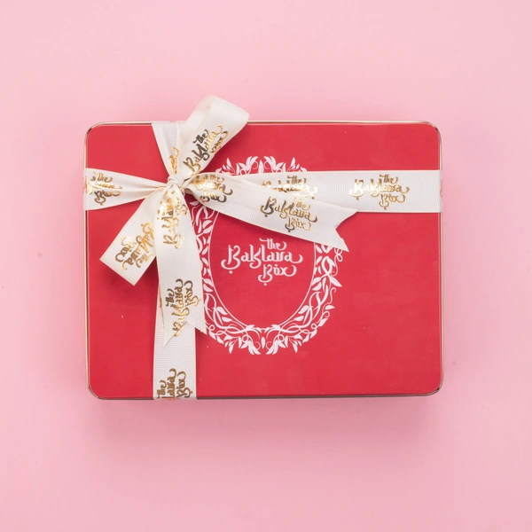 Assorted Red Tin Chocolate Baklava Box With White Ribbon Packing - 350 Gm