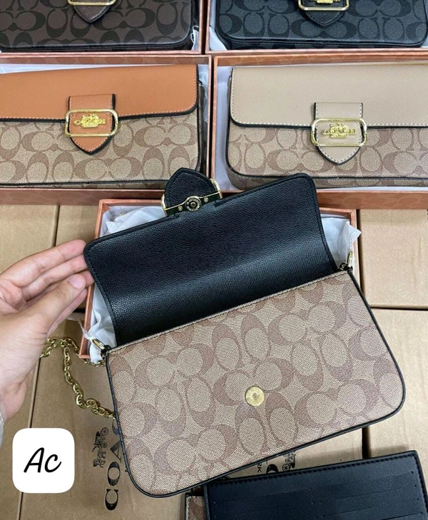 MORAGAN POCHETE COACH. | Hand Bags.| Luxurybrandzone| 