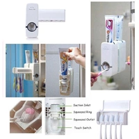 TOOTHPASTE DISPENSER & TOOTH BRUSH HOLDER