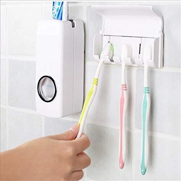 TOOTHPASTE DISPENSER & TOOTH BRUSH HOLDER