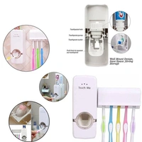 TOOTHPASTE DISPENSER & TOOTH BRUSH HOLDER