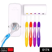 TOOTHPASTE DISPENSER & TOOTH BRUSH HOLDER