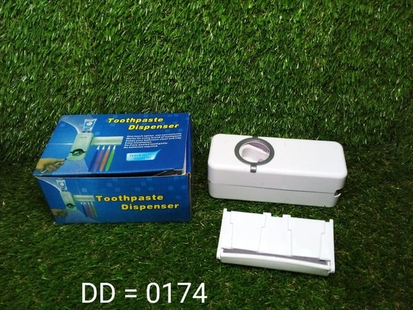 TOOTHPASTE DISPENSER & TOOTH BRUSH HOLDER