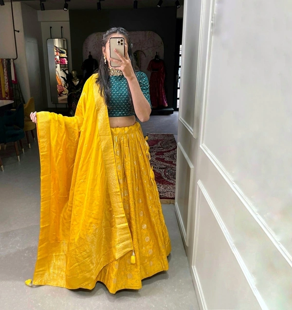 Antique Fashion  The trendy designer viscose chanderi lehenga is every bit dreamy and ethereal. Be it sangeet, mehendi or other bridal occasions this outfit deserves all praise - yellow