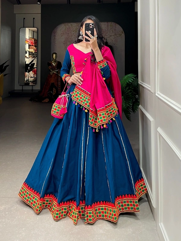 Antique Fashion 1 The intricate details in pure cotton lehenga with art of gamthi work lace and hues of a pink and blue color to add touch of tradition and grace in your navratri look.