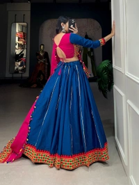 Antique Fashion 1 The intricate details in pure cotton lehenga with art of gamthi work lace and hues of a pink and blue color to add touch of tradition and grace in your navratri look.