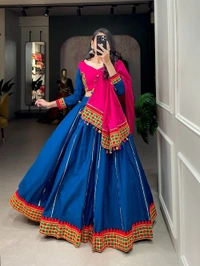 Antique Fashion 1 The intricate details in pure cotton lehenga with art of gamthi work lace and hues of a pink and blue color to add touch of tradition and grace in your navratri look.