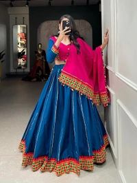 Antique Fashion 1 The intricate details in pure cotton lehenga with art of gamthi work lace and hues of a pink and blue color to add touch of tradition and grace in your navratri look.