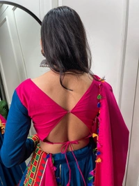 Antique Fashion 1 The intricate details in pure cotton lehenga with art of gamthi work lace and hues of a pink and blue color to add touch of tradition and grace in your navratri look.
