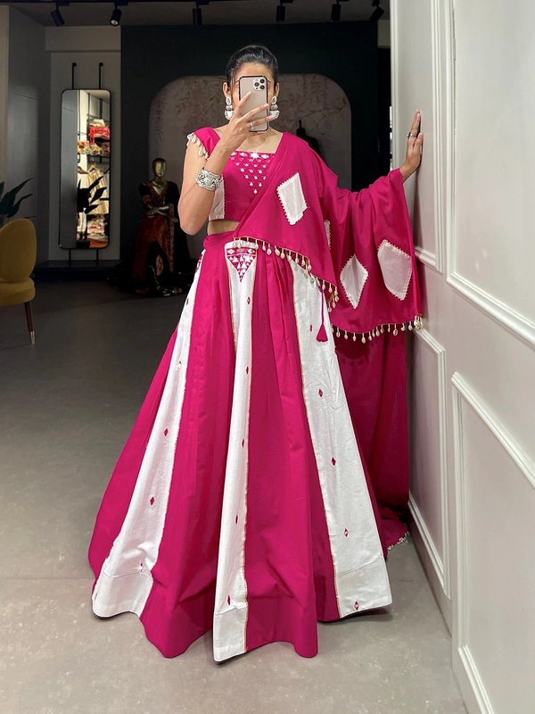 Antique Fashion  This lehenga is crafted with intricate mirror work and adorned with cowrie work lace details adding a touch of blended pink and white color to create best navratri look for you   - pink