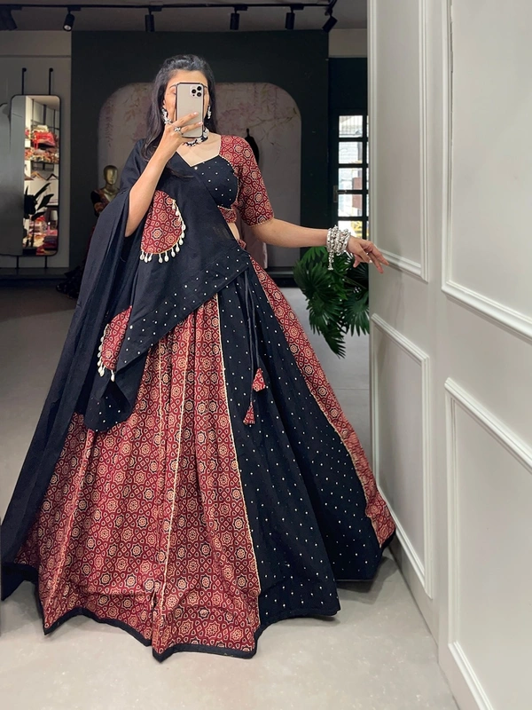 Antique Fashion 1 Presenting to you our latest masterpiece of navratri collection. Dress up into this printed new maroon color and the mirror work chaniya choli  to a create your garba look more significant 🖤