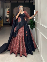 Antique Fashion 1 Presenting to you our latest masterpiece of navratri collection. Dress up into this printed new maroon color and the mirror work chaniya choli  to a create your garba look more significant 🖤