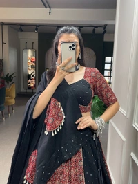 Antique Fashion 1 Presenting to you our latest masterpiece of navratri collection. Dress up into this printed new maroon color and the mirror work chaniya choli  to a create your garba look more significant 🖤