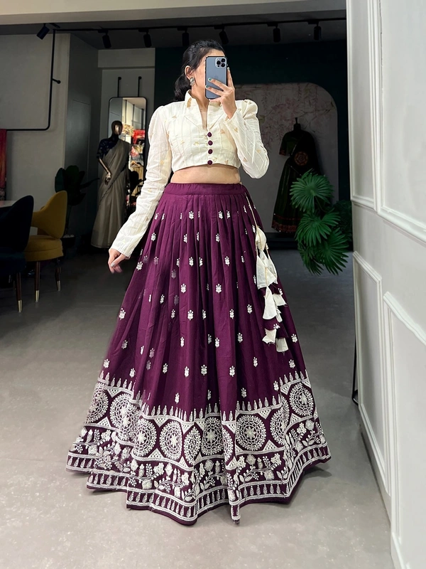 Antique Fashion 1 Steal the spotlight by adoring this wine lehenga in  pure cotton  material embellished with Lucknowi work also featured with beautiful hand made heavy tassels 