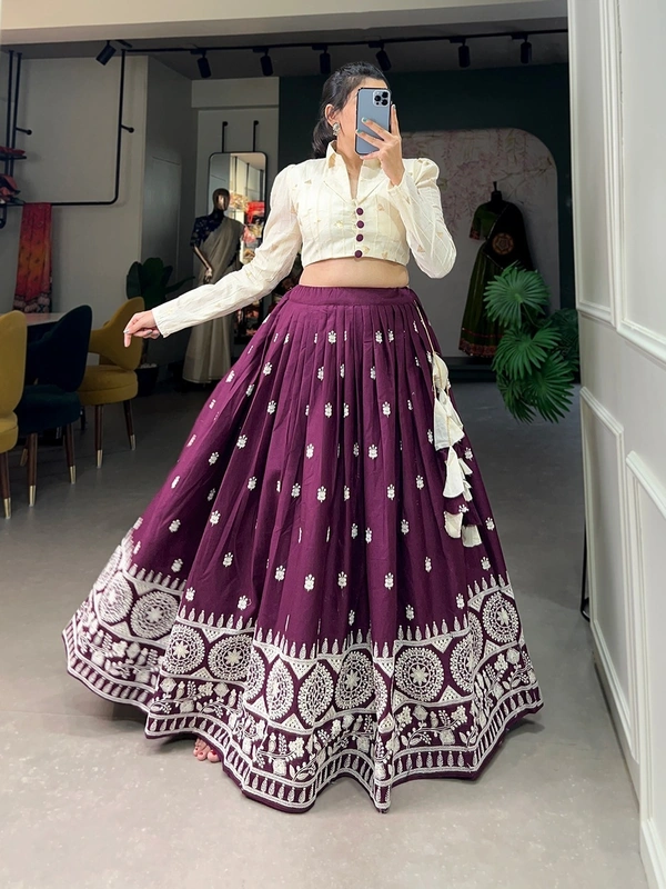 Antique Fashion 1 Steal the spotlight by adoring this wine lehenga in  pure cotton  material embellished with Lucknowi work also featured with beautiful hand made heavy tassels 