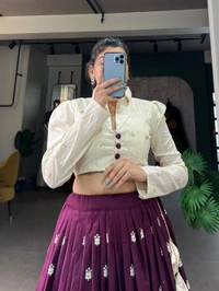 Antique Fashion 1 Steal the spotlight by adoring this wine lehenga in  pure cotton  material embellished with Lucknowi work also featured with beautiful hand made heavy tassels 