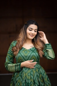Antique Fashion 1 Presenting a perfectly blended endless array of patterns, designs and  colors , that represents a vibrant indian culture & true essence of our traditional gaji silk bandhej gown. - green