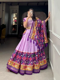 Antique Fashion 1 Step into the world of sheer Tussar Silk with Patola Print magic with these stunning lehenga! 💫 - levender