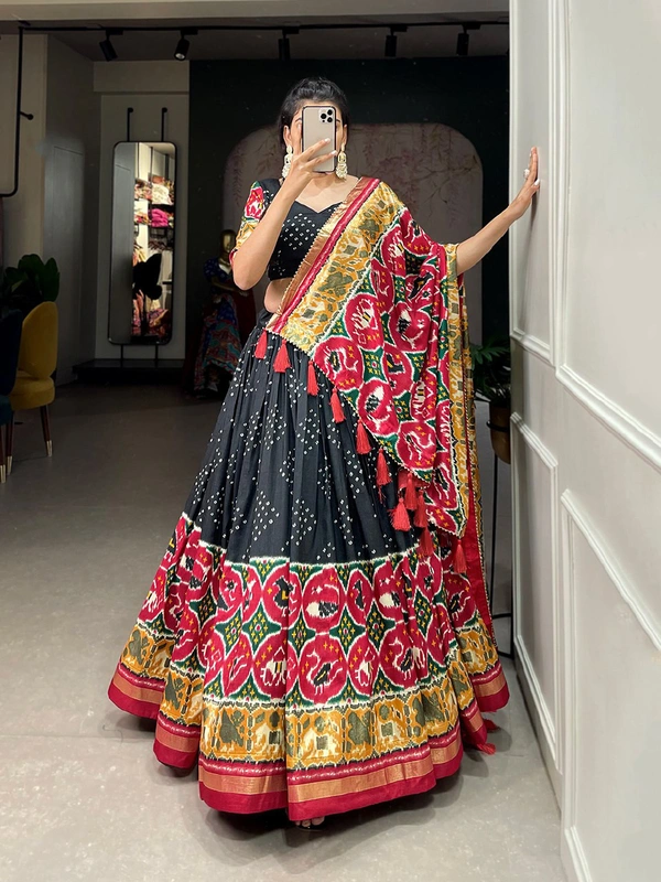 Antique Fashion  Step into the world of sheer Tussar Silk with Patola Print magic with these stunning lehenga! 💫 - Black