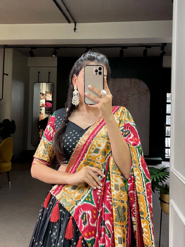Antique Fashion  Step into the world of sheer Tussar Silk with Patola Print magic with these stunning lehenga! 💫 - Black