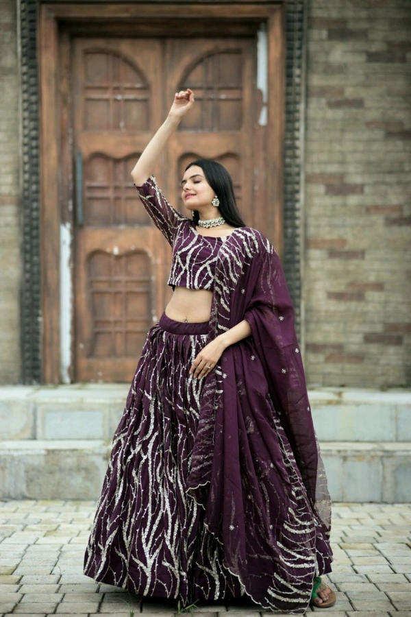 Antique Fashion 1 Enchanting Designer Tebby Silk Lehenga choli with Dupatta Set.  - wine