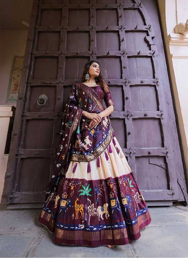 Antique Fashion  For your essential part of gujarati collection we are presenting Ethnic attire of dola silk lehenga - wine