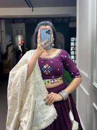 Antique Fashion 1 Presenting a perfectly blended endless array of patterns, designs, color, mirror work and lucknowi dupatta, that represents a vibrant gujarati culture & true essence of our festival choli. 