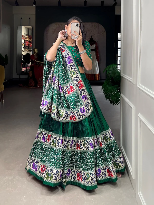 Antique Fashion  Crush dola silk lehenga with a gorgeous design of bandhej print and patola print will give you perfect look for your family function🌙💫