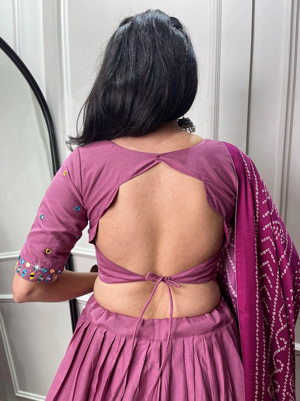 Antique Fashion  Get traditional look of your choice with this classic yet conventional plain lehenga and mirror work blouse 