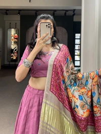 Antique Fashion 1 Get traditional look of your choice with this classic yet conventional plain lehenga and mirror work blouse 