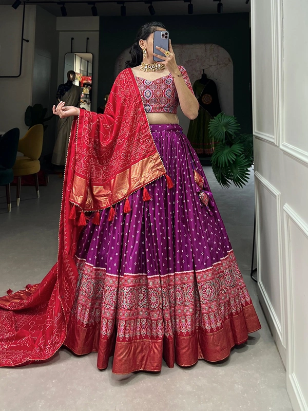 Antique Fashion  The timeless bandhani print chaniya choli showcases intricate ajrakh print and foil lacework  combining elegance and tradition in a stunning ensemble for Function  - Purple