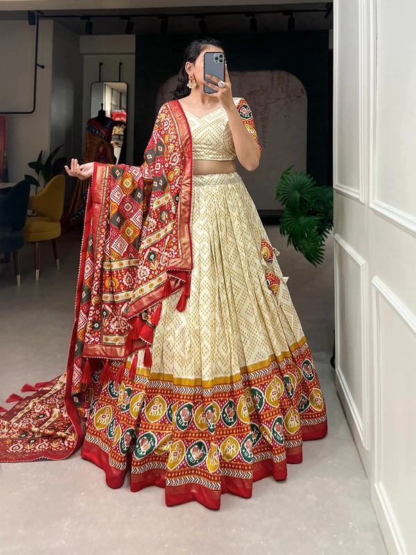 Antique Fashion 1 This beautifully printed lehengadesign going from a royal shade ensemble for function - off white