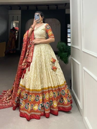 Antique Fashion 1 This beautifully printed lehengadesign going from a royal shade ensemble for function - off white